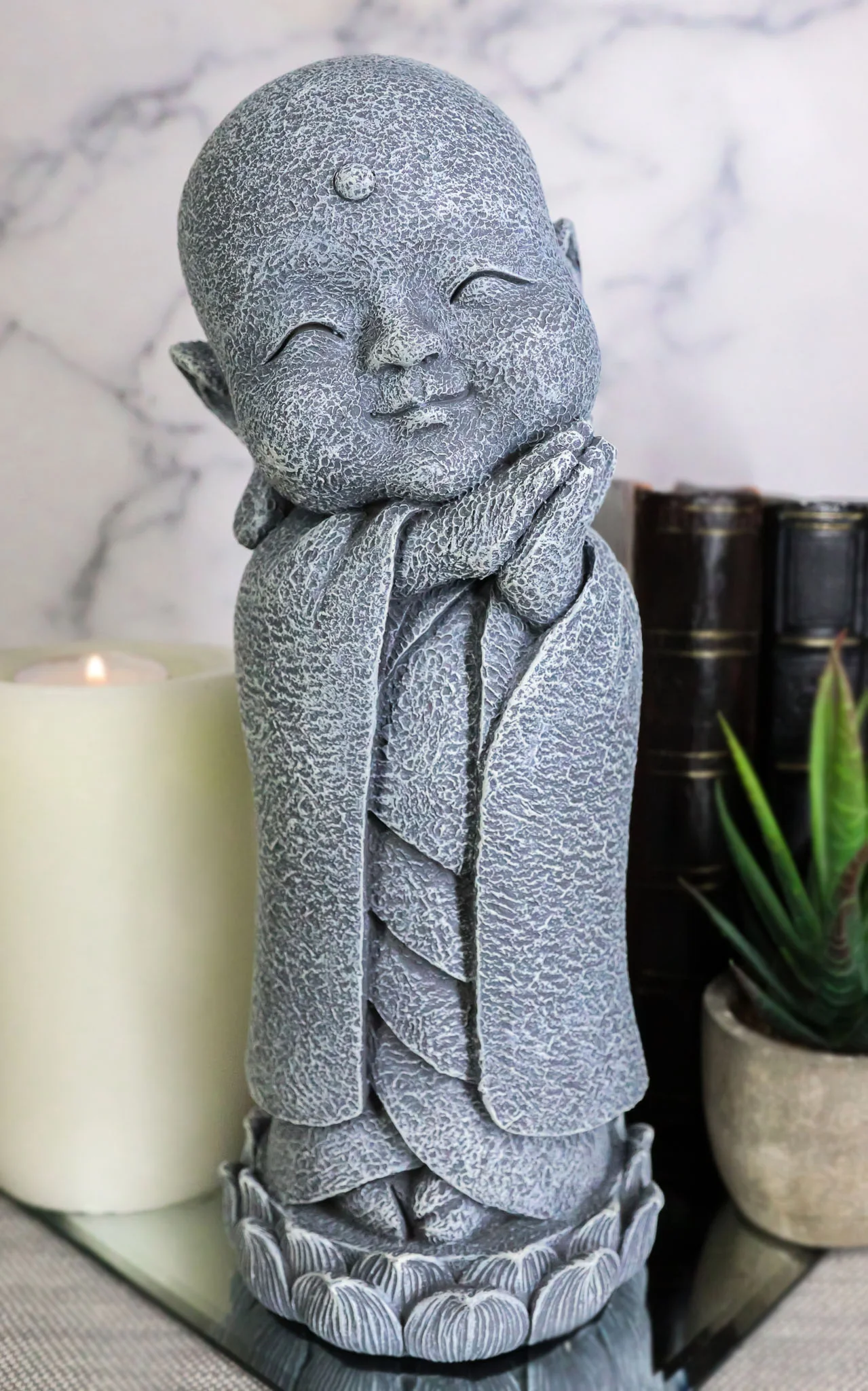 Ebros Japanese Jizo Monk Standing On Lotus Figurine 9.75"H (Hands On Left Cheek)
